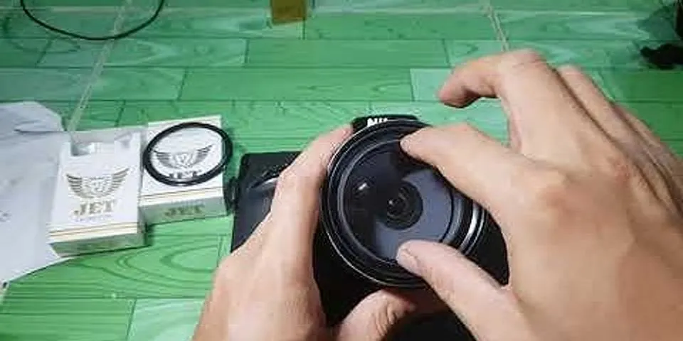 Cách tháo lens máy ảnh Fujifilm