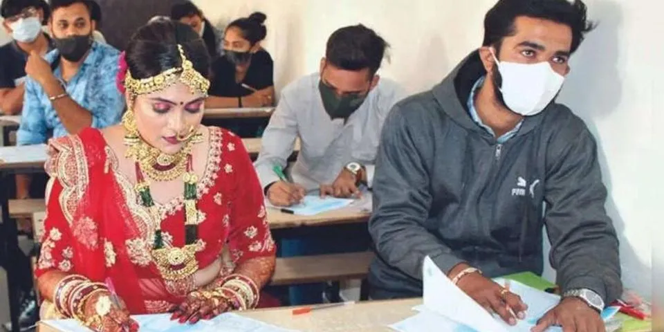 Gujarat: Cô dâu Rajkot ưu tiên nghiên cứu về đám cưới, xuất hiện cho kỳ thi đại học trong trang phục đám cưới
