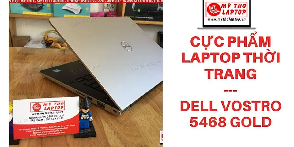 Laptop Dell màu vàng đồng
